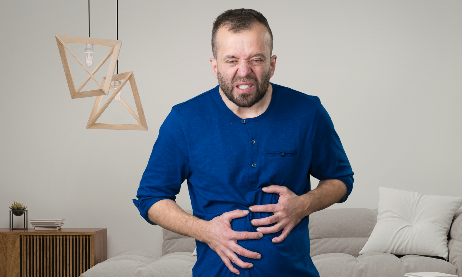 Man holding his stomach