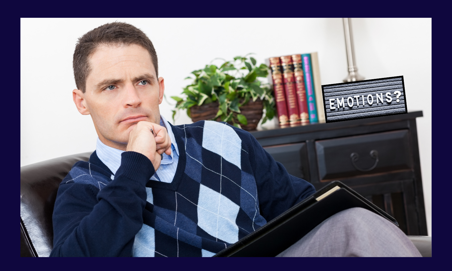 Stoic man sitting in a chair with a sign in the background reading, "emotions?"